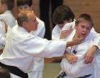 Putin Kicks Kids Asses.jpg