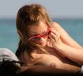 mena_suvari-beach_topless_06.jpg