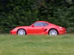 2007-Porsche-Cayman-Red-Driver-Side-Speed-1920x1440.jpg