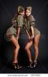 stock-photo-two-sexy-women-in-military-uniform-posing-against-dark-background-35575930.jpg