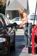 sophie_monk_pumps_gas_4.jpg