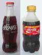 453px-Coca_cola_bottles_-_200ml_glass_and_300ml_plastic_-_China.jpg