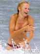 pamela-anderson-goes-topless-on-a-beach-in-france-06-675x900.jpg