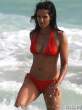 padma-lakshmi-in-an-orange-bikini-at-the-beach-08-435x580.jpg
