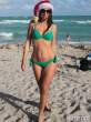 claudia-romani-in-a-green-bikini-on-the-beach-in-miami-01-435x580.jpg