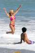 Lisa Rinna  sports a hot pink bikini while on the beach in Malibu. Aug 22, 2010 (20).jpg