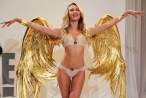 candice-swanepoel-s-fitting-for-the-2014-victoria-s-secret-fashion-show-behind-the-scenes_6.jpg