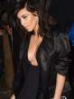 Kim-Kardashian-Deep-Shiny-Cleavage-In-Black-Heading-To-See-Kanye-At-SNL-40th-Anniversary-06-675x900.jpg